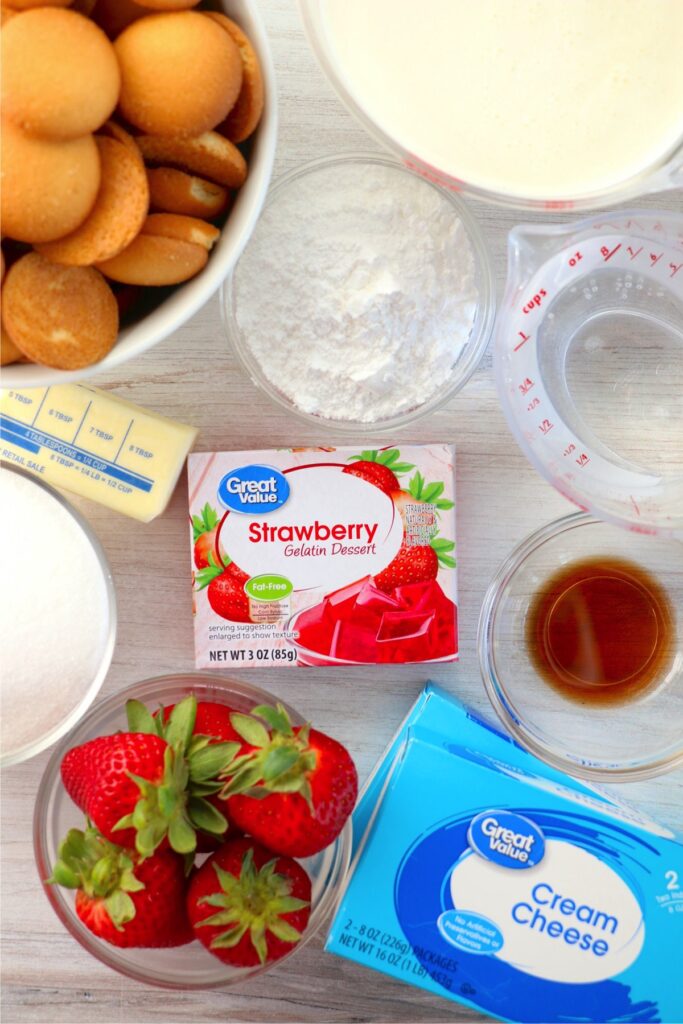 Overhead shot of individual cheesecake ingredients on table