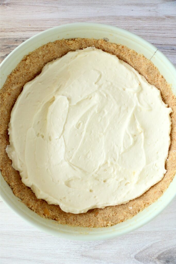 Overehead shot of cream cheese mixture spread over Nilla wafer crust