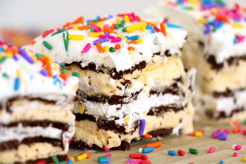 Closeup shot of three slices of easy ice cream sandwich cake on table