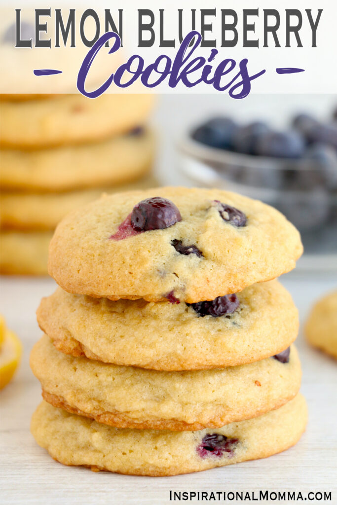 Lemon blueberry cookies stacked atop one another on table