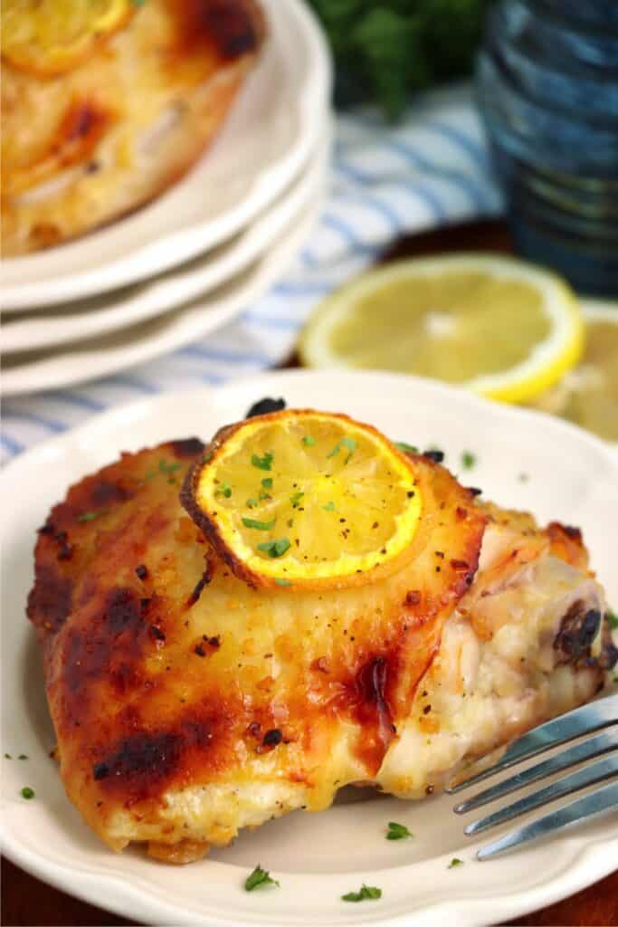 Closeup shot of honey garlic lemon pepper chicken thigh on plate