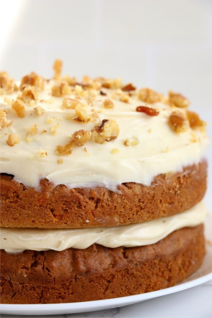 Closeup shot of frosted air fryer carrot cake on plate