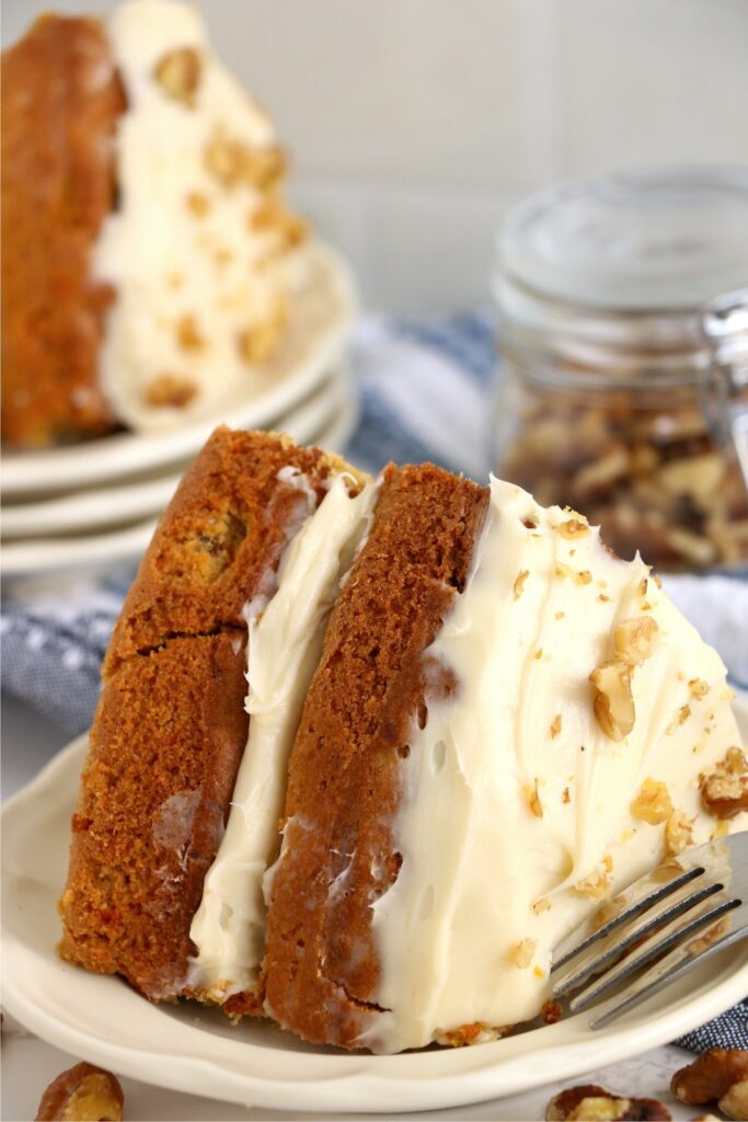 Closeup shot of slice of air fryer carrot cake on plate