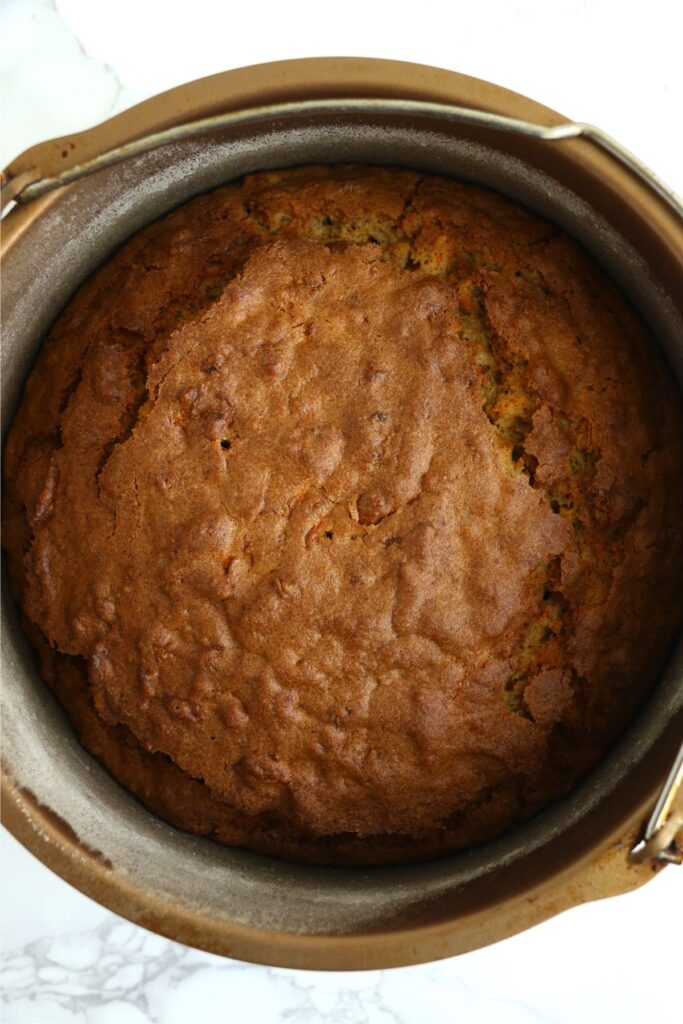 Overhead shot of cooked air fryer carrot cake in baking dish