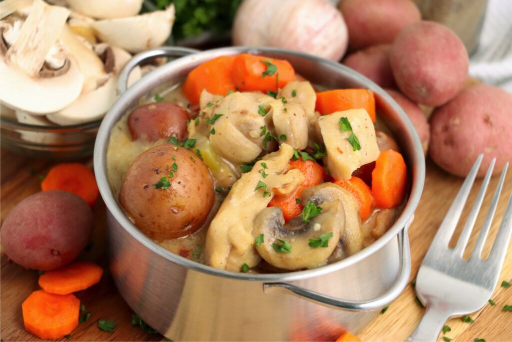 Closeup shot of pot with chicken thigh stew.