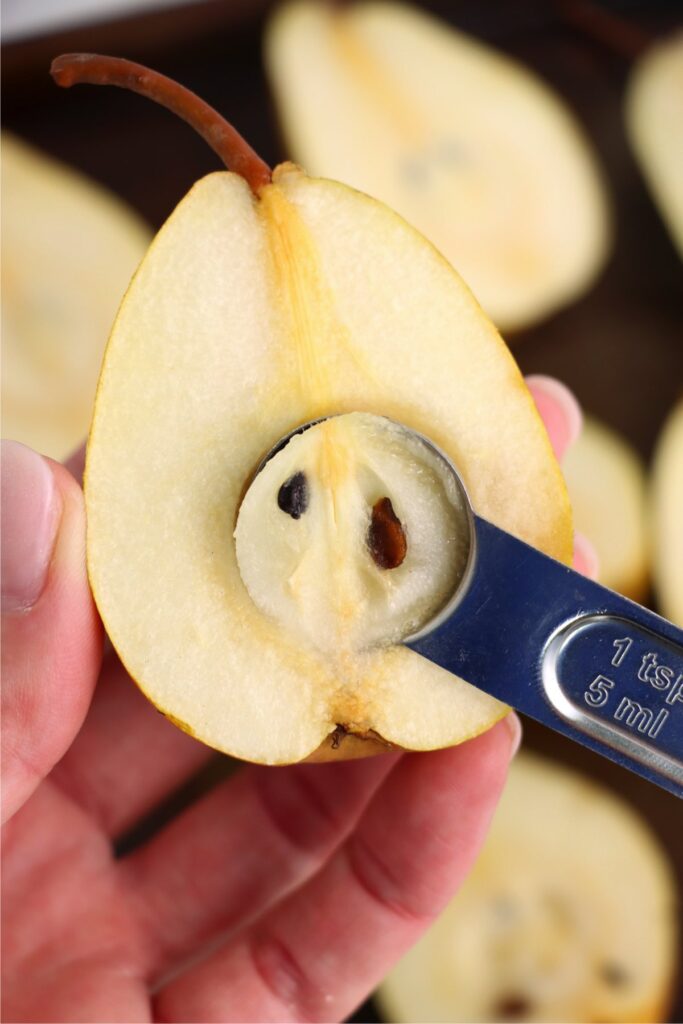 Closeup shot of pear being cored