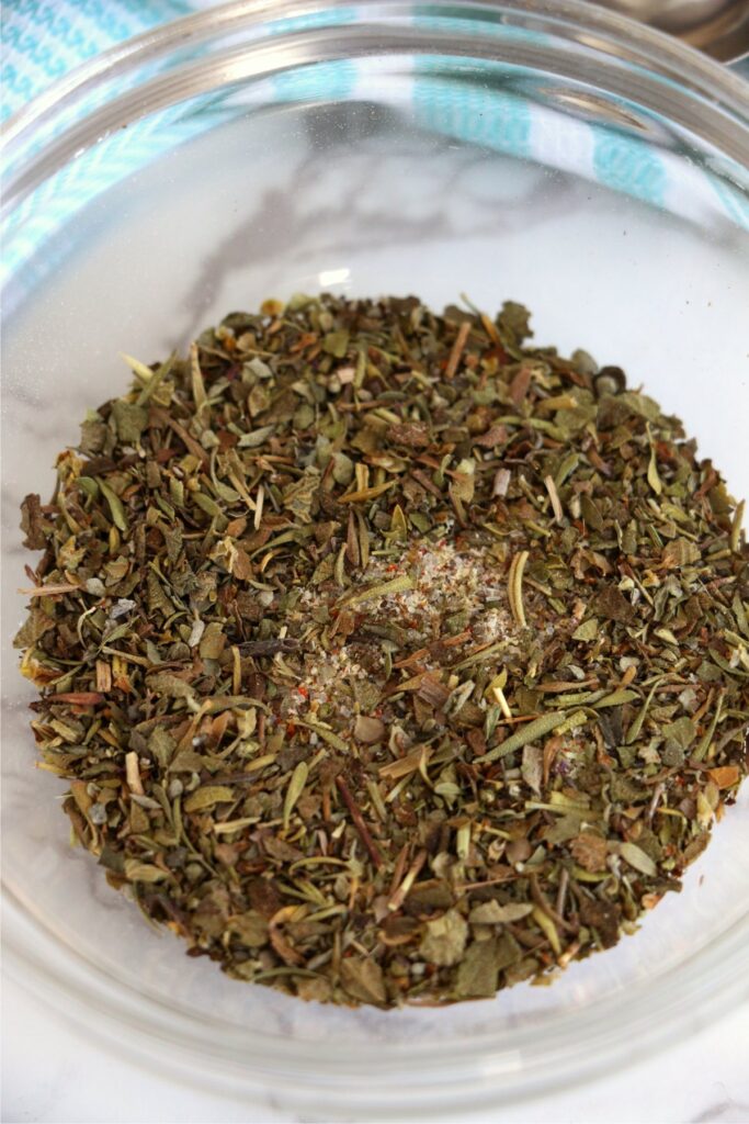 Overhead shot of meatloaf seasoning in mixing bowl.