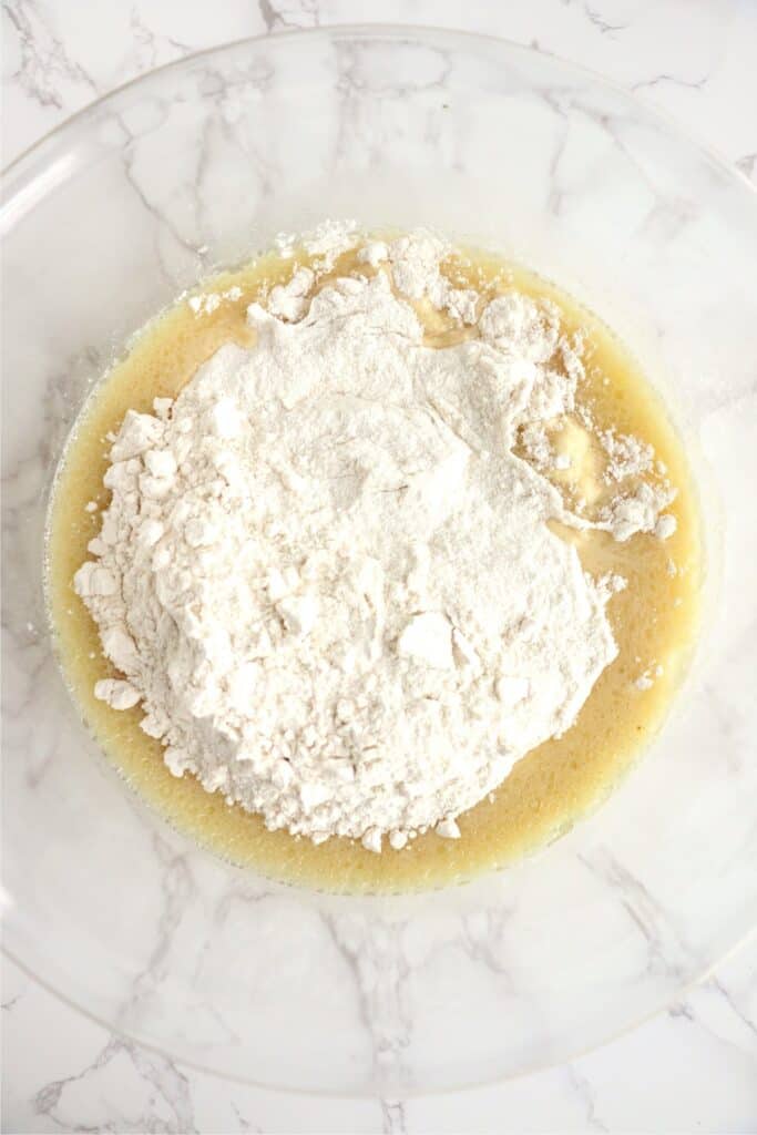 Overhead shot of wet and dry ingredients in bowl