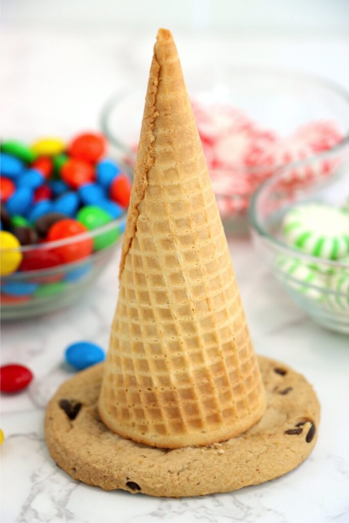 Sugar cone sitting on top of cookie