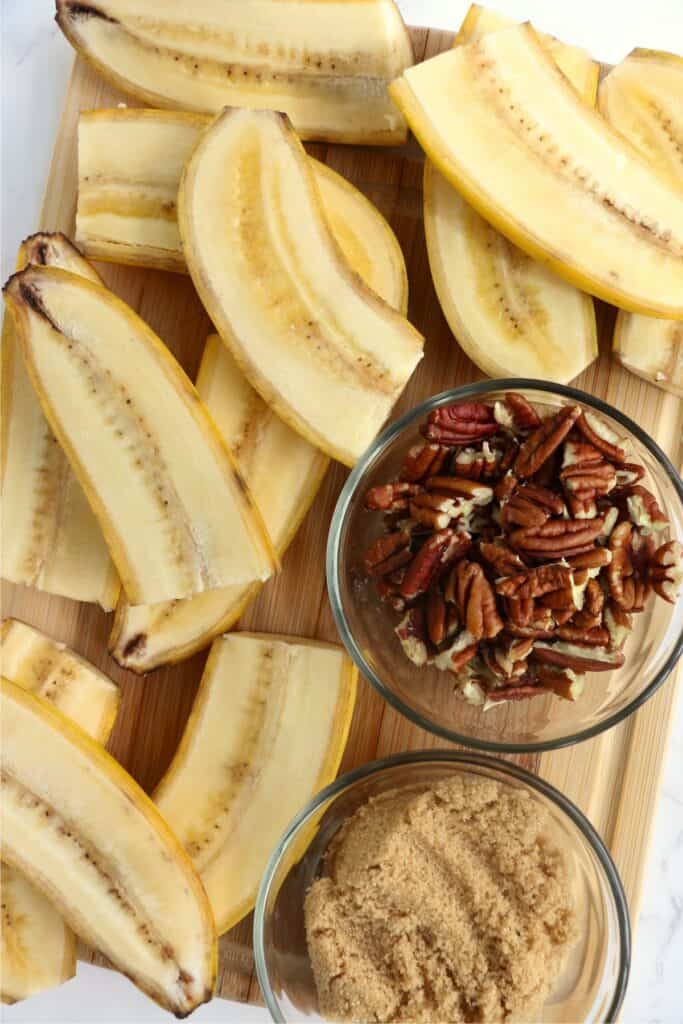 Overhead shot of air fryer banana ingredients on cutting board