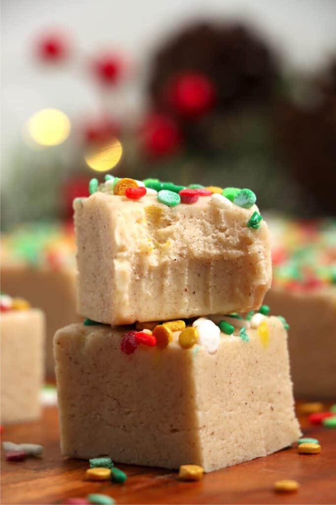 Closeup shot of two Christmas cookie fudge squares stacked atop one another