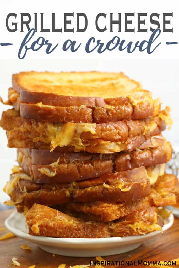 Closeup shot of oven baked grilled cheese sandwiches stacked atop one another on plate