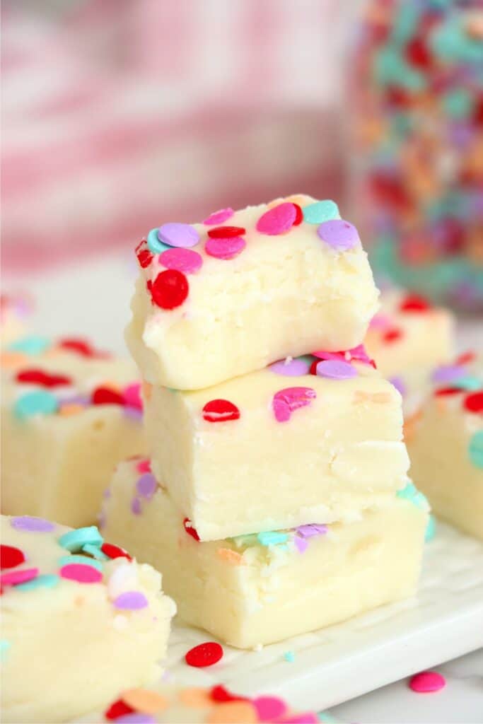 Closeup shot of three potato fudge squares stacked atop one another