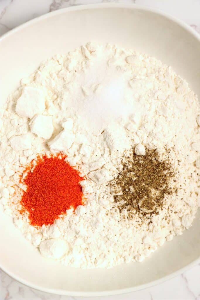 Closeup overhead shot of flour and seasonings in bowl