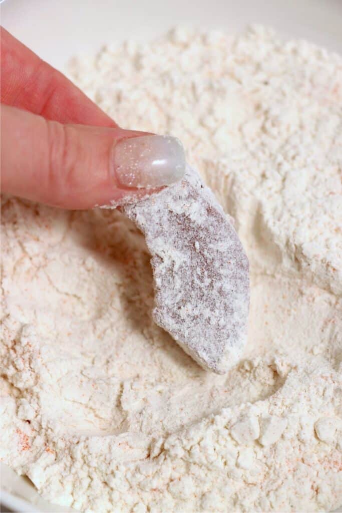 Closeup shot of piece of venison heart coated in flour and seasonings