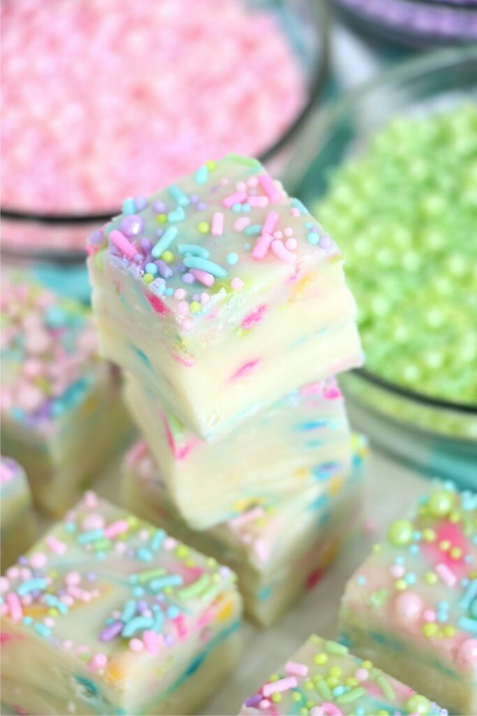 Overhead shot of Easter fudge squares stacked atop one another on plate