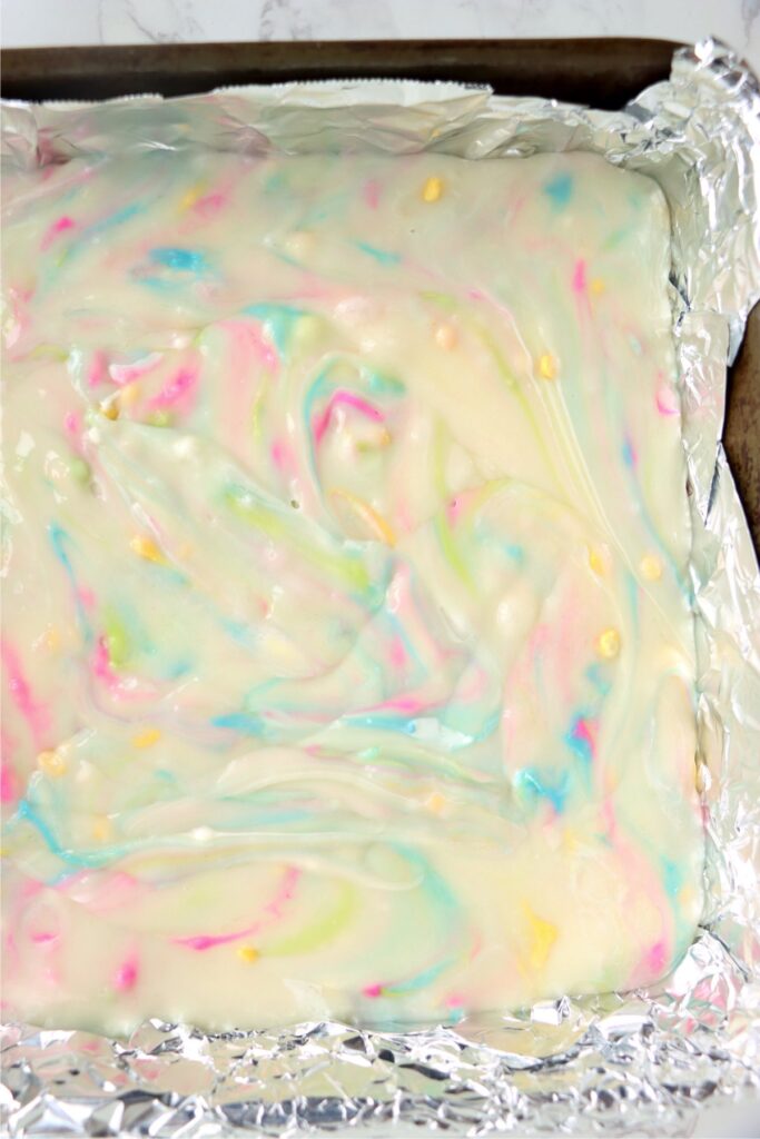 Overhead shot of Easter fudge in pan lined with foil