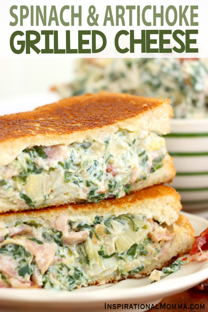 Closeup shot of two spinach artichoke grilled cheese halves stacked atop one another on plate