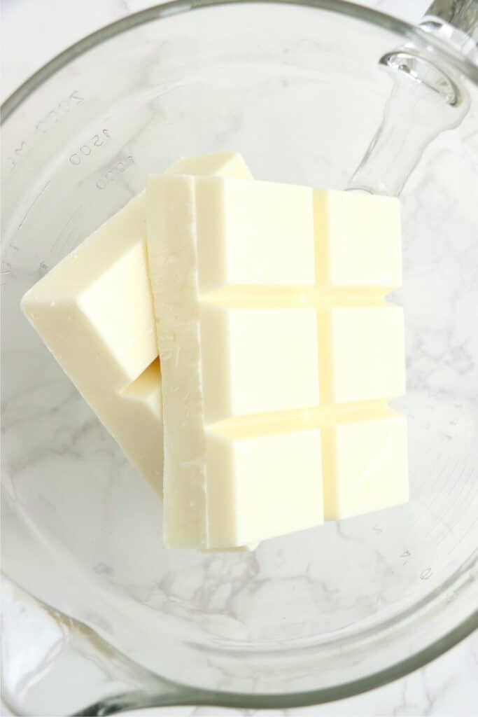 Closeup overhead shot of almond bark chunks in bowl