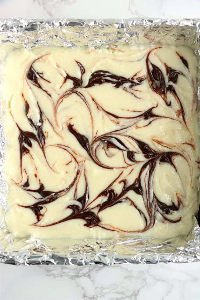 Overhead shot of white fudge swirled with hot fudge sauce