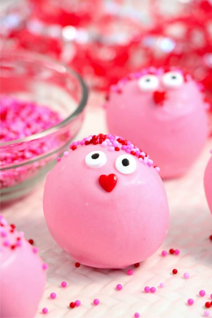 Closeup shot of two Valentine Oreo truffles on plate