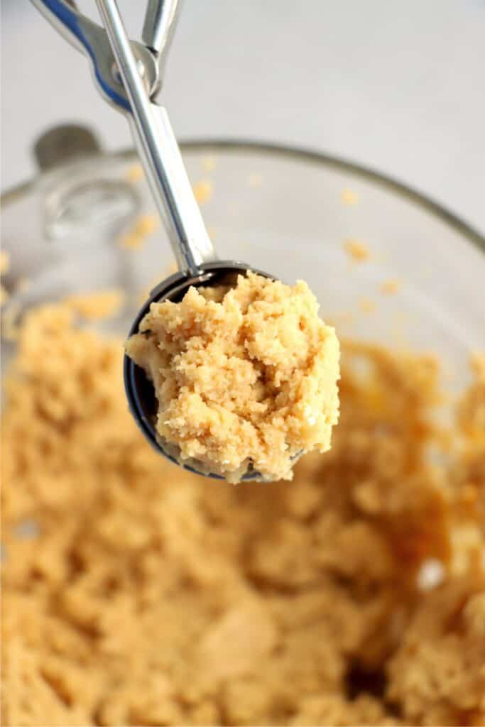 Closeup shot of cookie scoop full of Oreo mixture