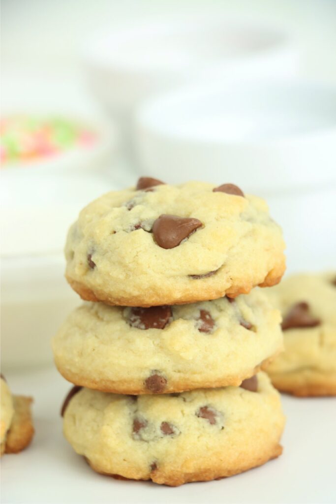 Closeup shot of three chocolate chip cookies stacked atop one another