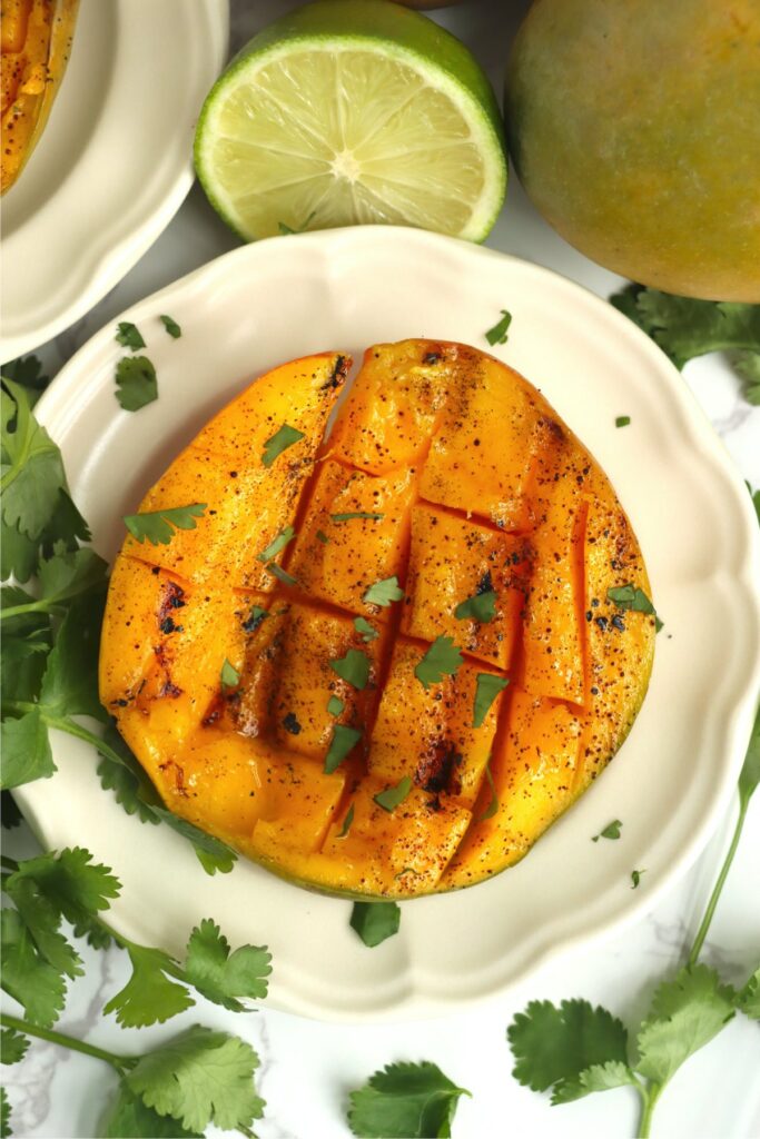 Overhead shot of grilled mango on plate