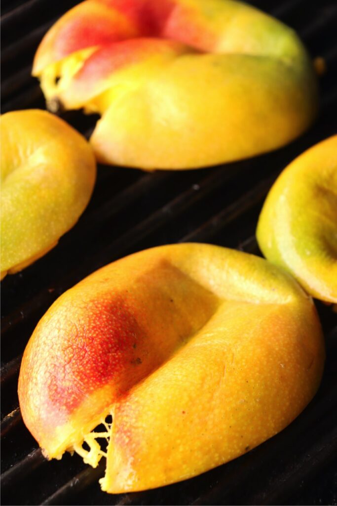 Mangoes being grilled