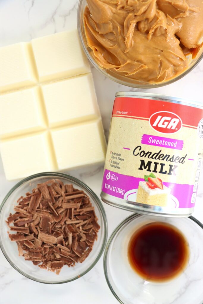 Overhead shot of individual fudge ingredients in bowls on table