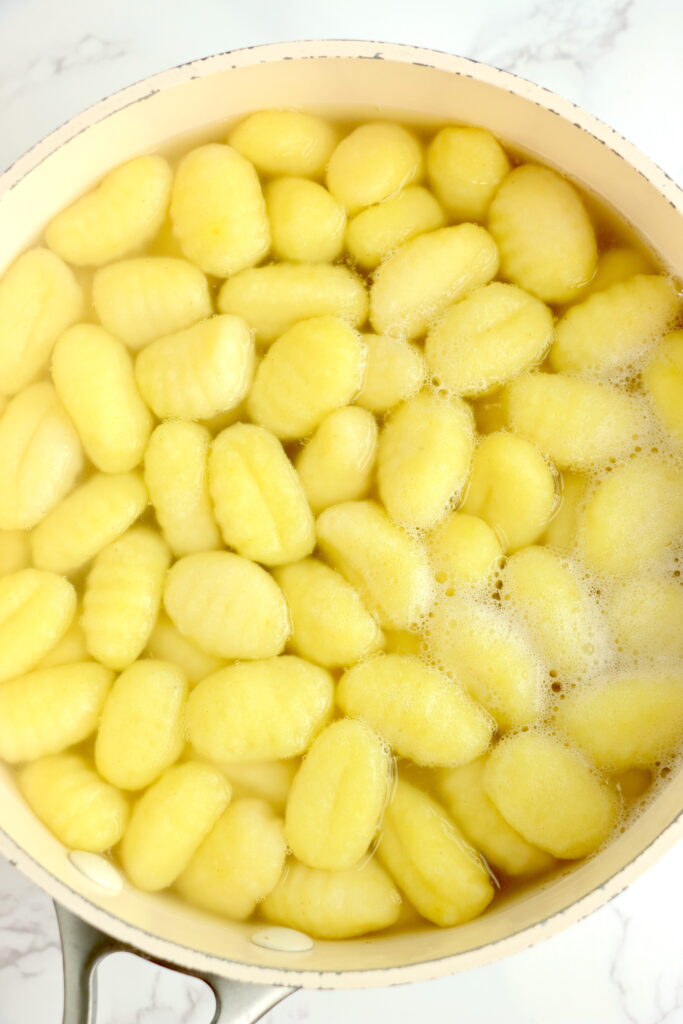 Overhead shot of potato gnocchi in pot