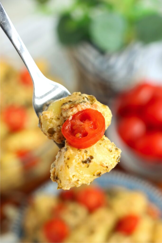 Closeup shot of forkful of pest gnocchi