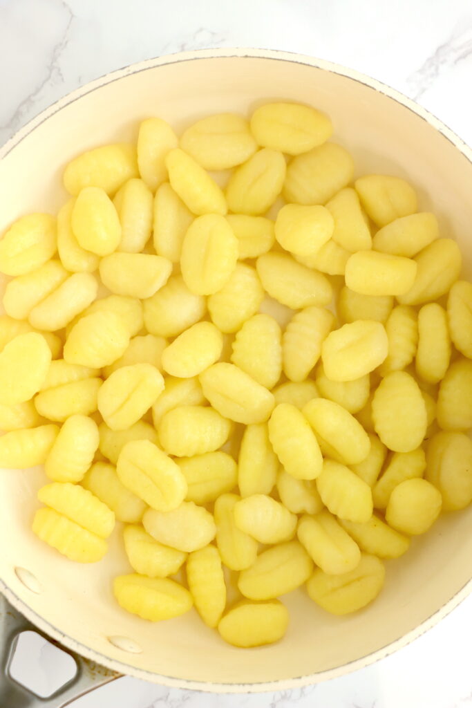 Overhead shot potato gnocchi in skillet