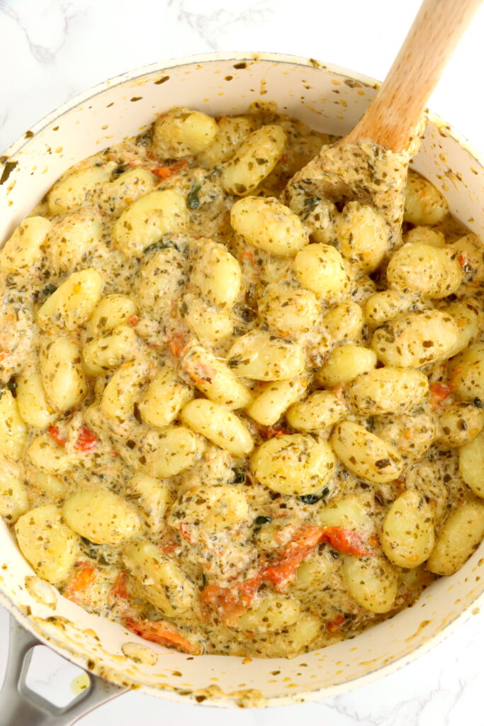 Overhead shot of pesto gnocchi in skillet