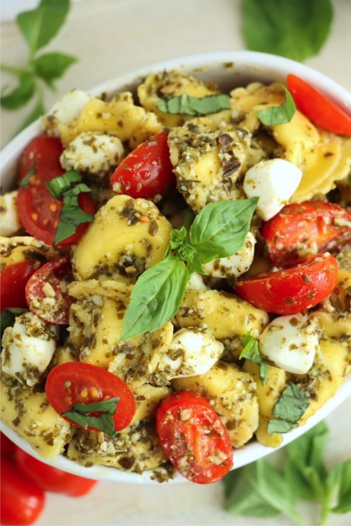 Overhead closeup shot of pesto tortellini salad