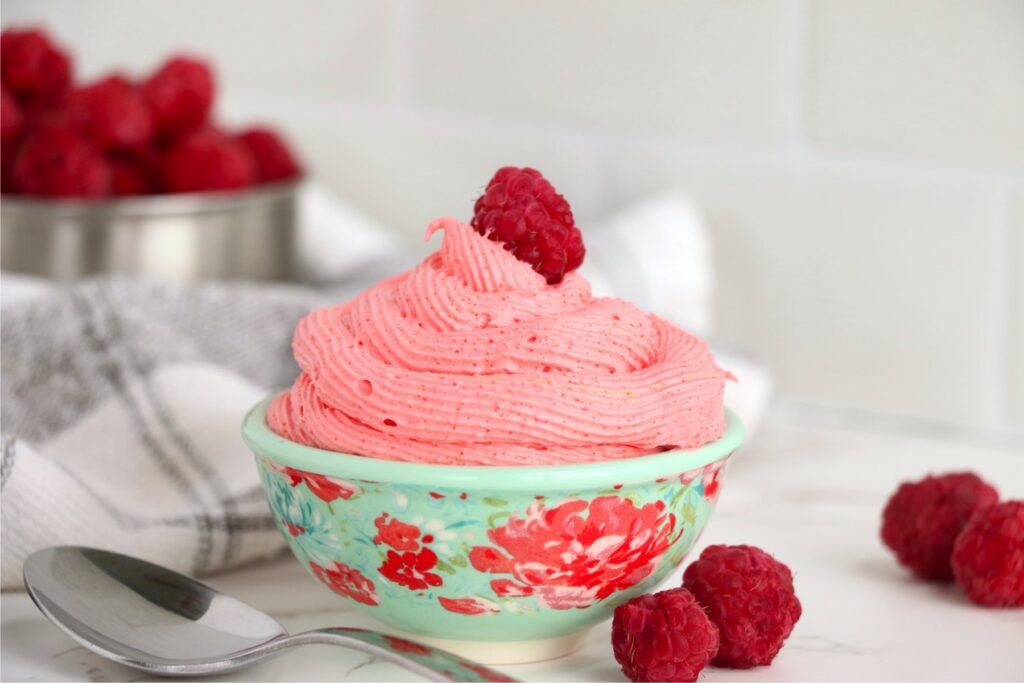 Closeup shot of raspberry Cool Whip dessert in bowl