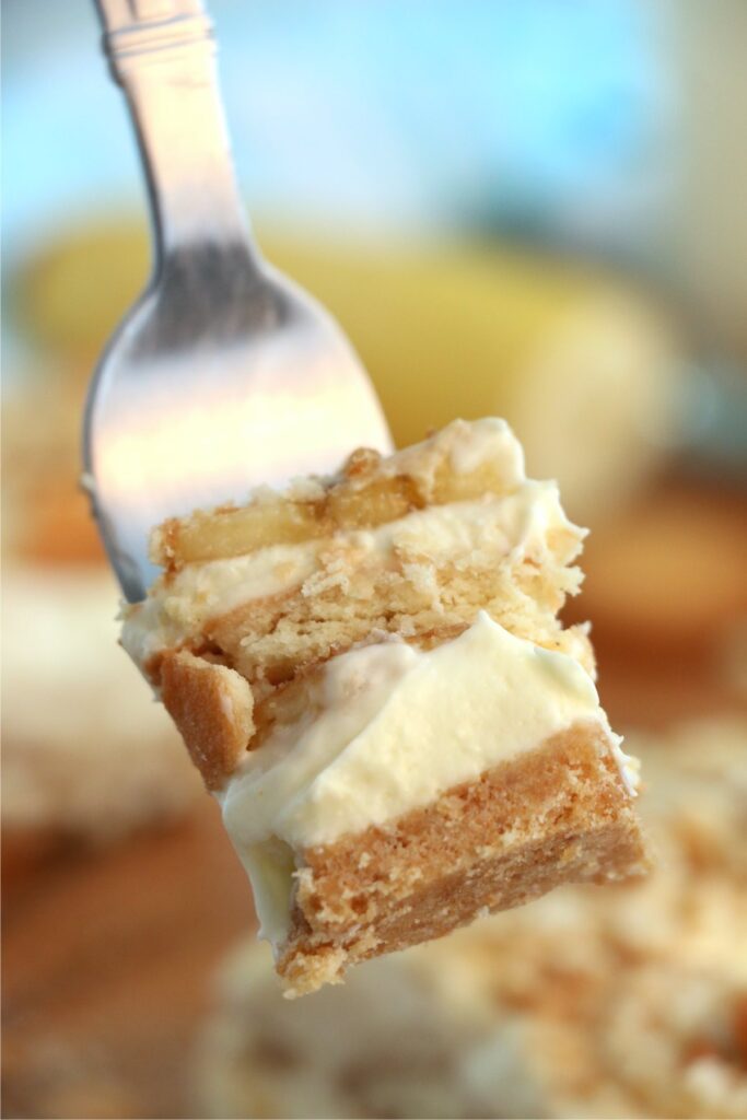 Closeup shot of forkful of banana pudding lasagna