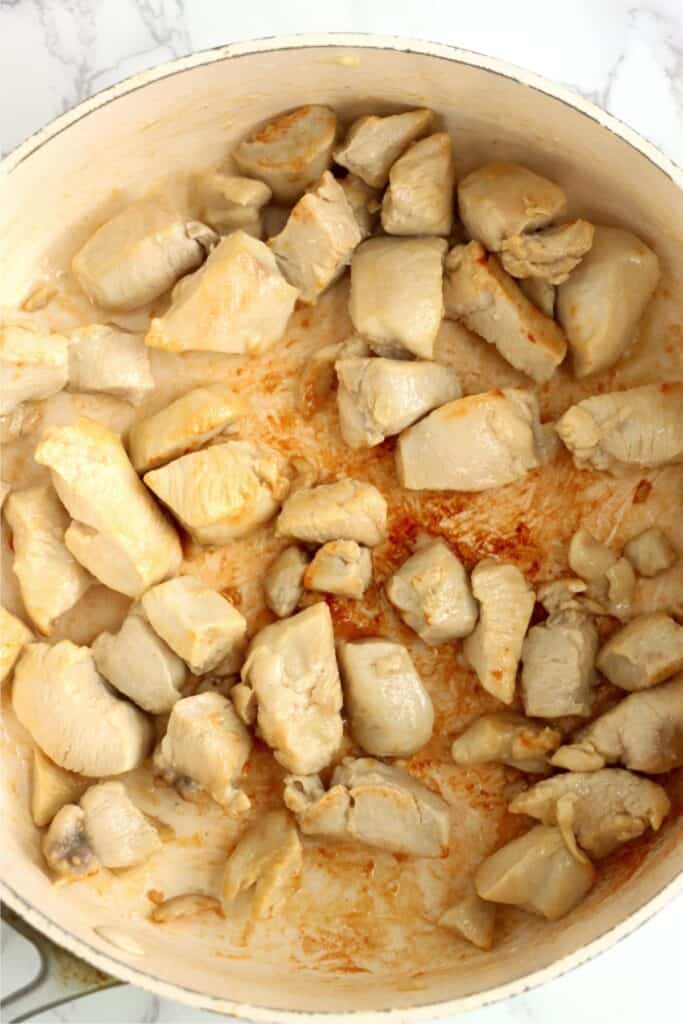 Overhead shot of cooked chicken in pan. 