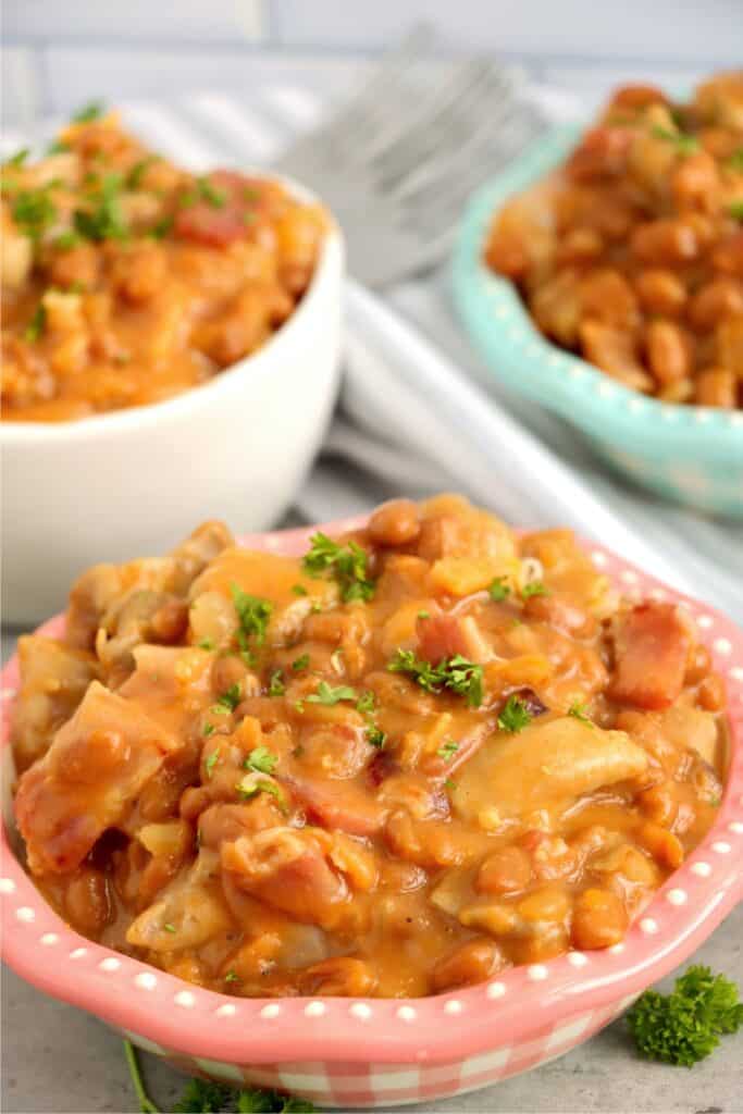 Closeup shot of beans bacon and chicken skillet in bowl