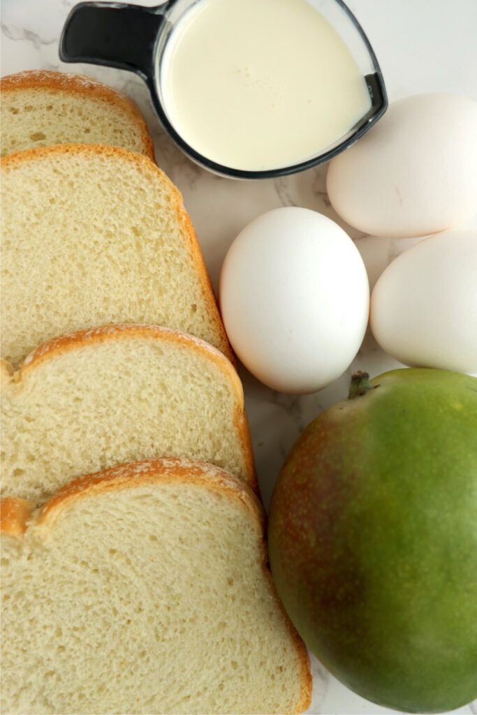 Overhead shot of individual French toast ingredients on table