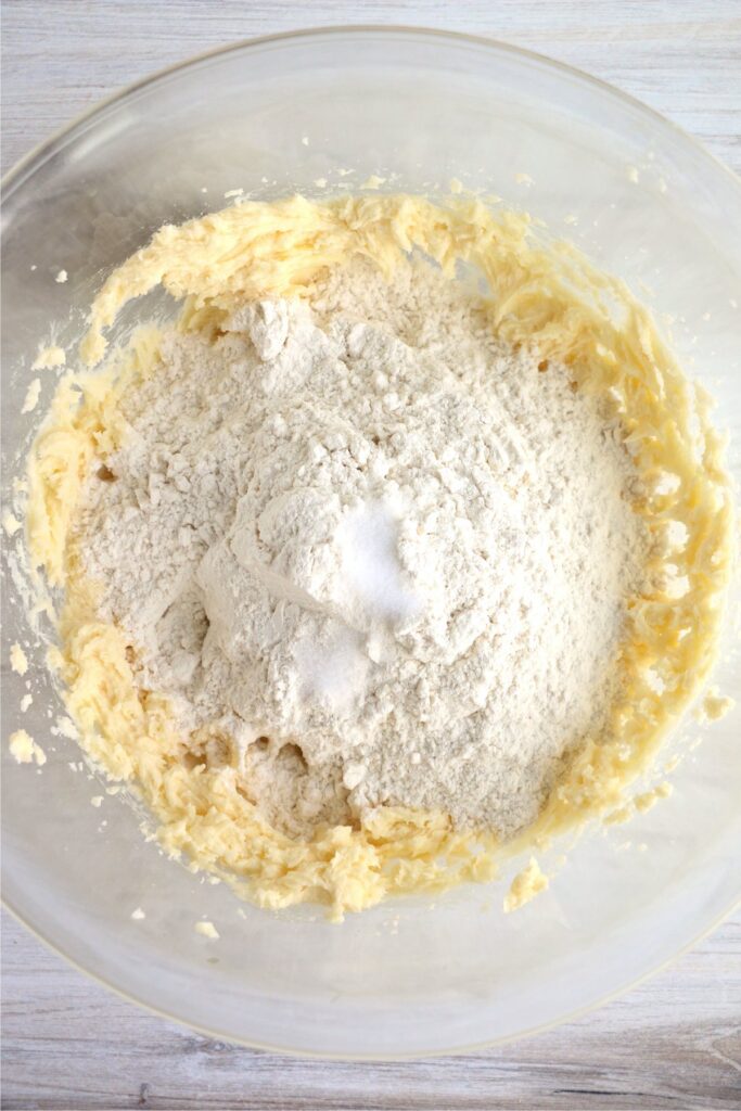 Overhead shot of dry ingreients on top of wet ingredients in bowl