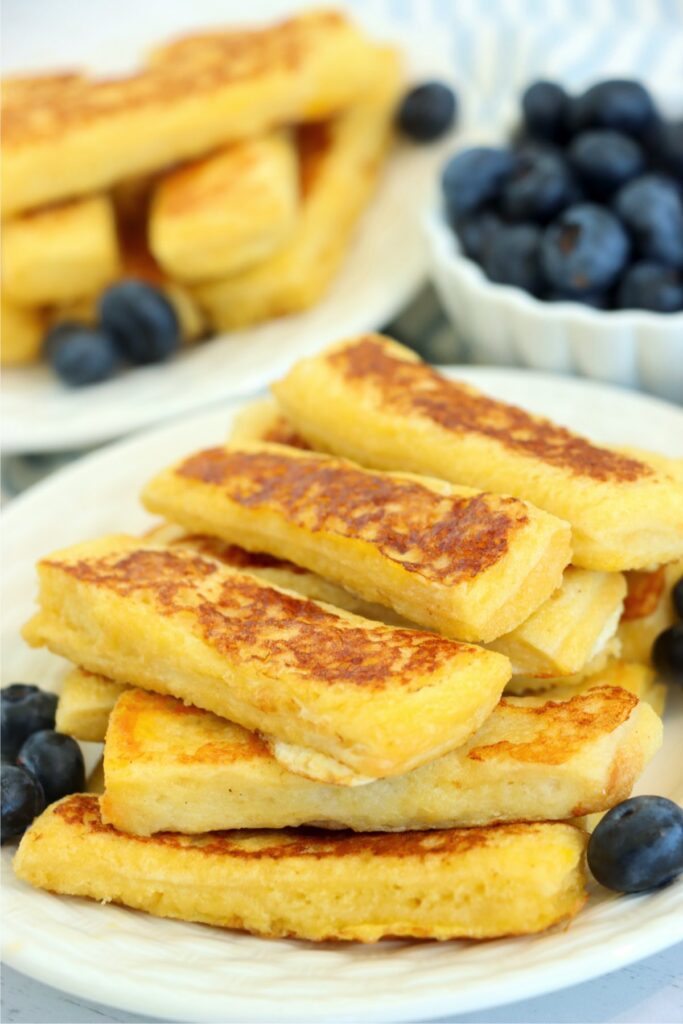 Closeup shot of Jack in the Box French toast sticks on plate. 