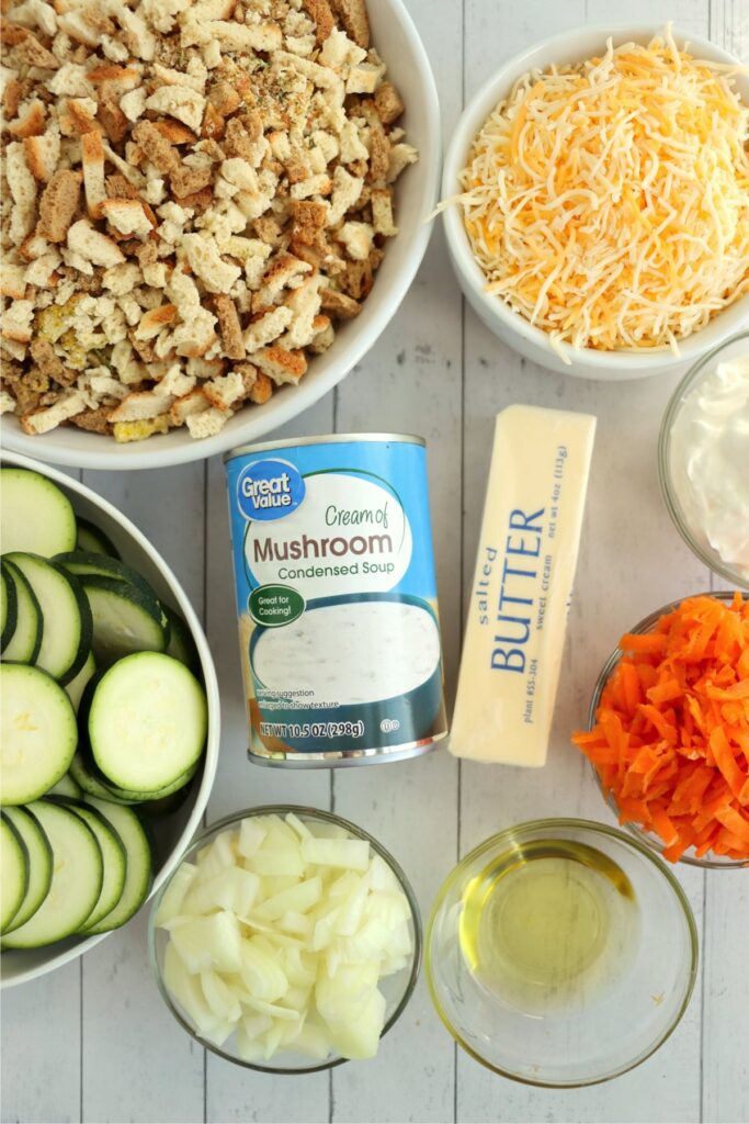 Overhead shot of individual ingredients for old fashioned zucchini casserole on table