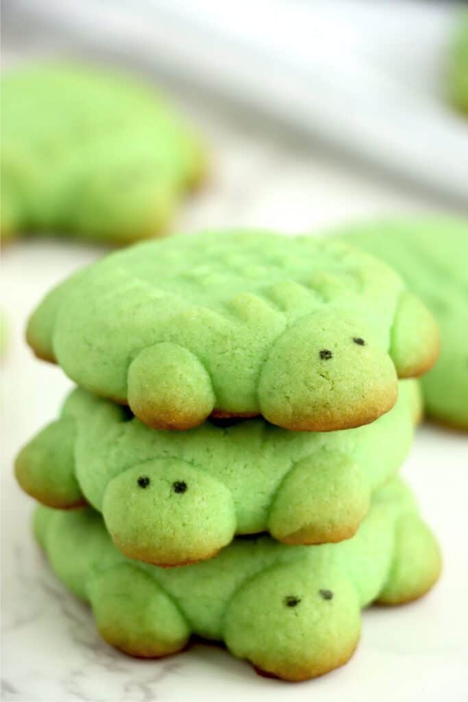 Closeup shot of sea turtle sugar cookies stacked atop one another