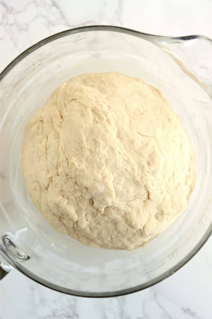 Overhead shot of bread dough in bowl