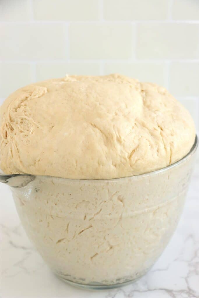 Bread dough in that's risen until doubled in size