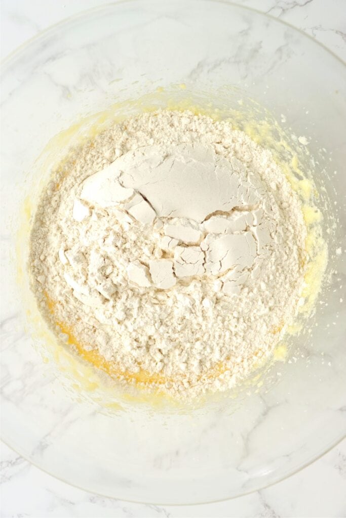Overhead shot of flour in bowl with wet mixed ingredients