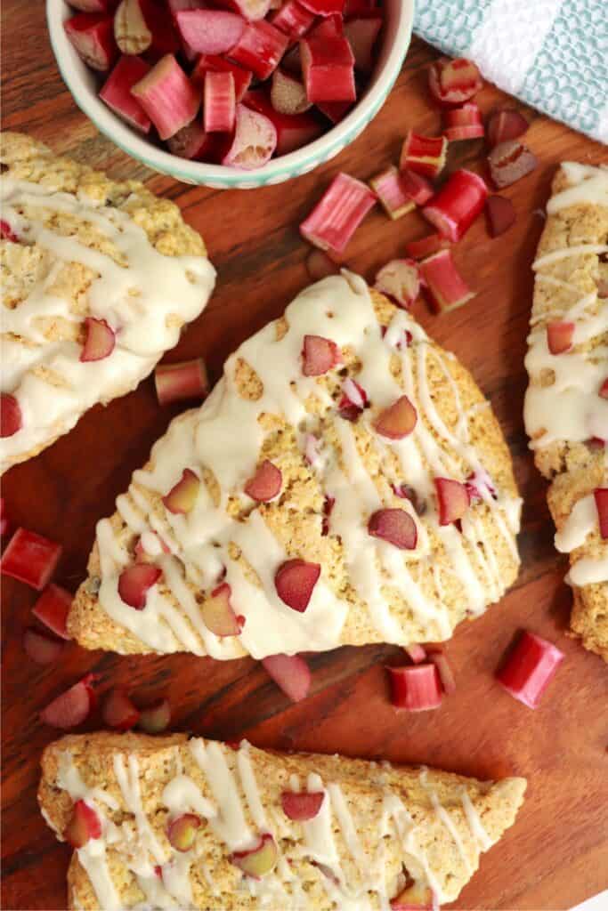 Overhead shot of homemade rhubarb scones on table. 