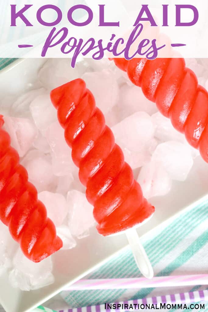 Closeup overhead shot of Kool Aid popsicles on tray of ice.