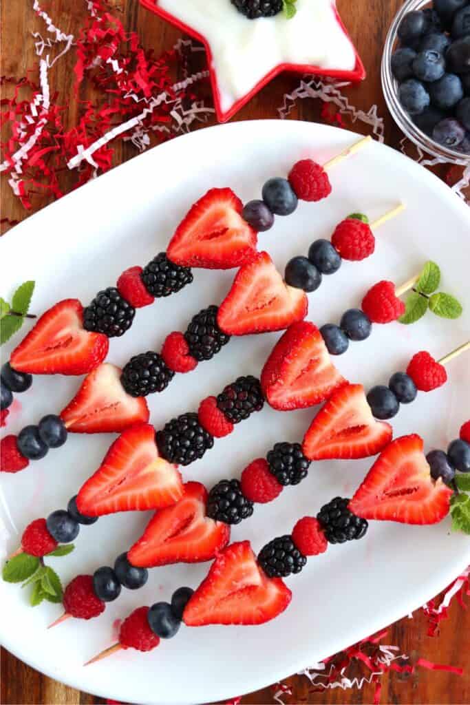 Overhead shot of 4ht of July fruit kabobs on plate